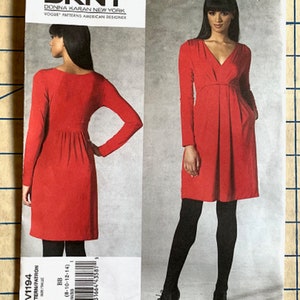 May include: A red dress sewing pattern from DKNY Donna Karan New York. The pattern is for sizes 8-10-12-14. The pattern includes a front and back view of the dress.