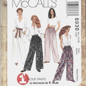 May include: McCall's sewing pattern for women's pants. The pattern features illustrations of four different pant styles, including wide-leg and striped designs. The size is Large (16,18). The text says "1 Hour Pants".