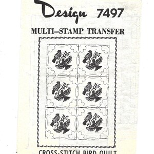 May include: A vintage cross-stitch pattern sheet titled "Design 7497". The design features a repeating pattern of birds and floral elements, framed within a decorative border. The text "Multi-Stamp Transfer" and "Cross-Stitch Bird Quilt" are also visible.