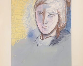 May include: An abstract portrait print featuring a woman's face with soft lines and pastel colors. The artwork has a yellow and blue background with a light blue foreground. The woman's face is drawn with brown outlines.