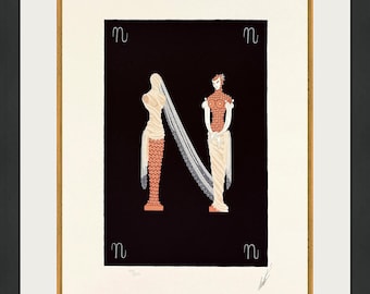 May include: Art Deco print showing the letter "N" created by two stylized figures in cream and coral hues against a black backdrop. The print is framed in gold and matted in white, with the letter "n" in each corner.