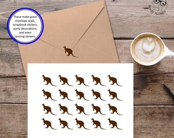 May include: A sheet of twenty brown kangaroo stickers and a matching brown envelope with a single kangaroo sticker on the flap. The text on the image reads: These make great envelope seals, scrapbook stickers, party decorations, and even tanning stickers.