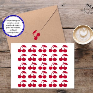 May include: A sheet of 36 red cherry stickers. The stickers are arranged in a grid pattern. The text "These make great envelope seals, scrapbook stickers, party decorations, and even tanning stickers." is written on a brown envelope.