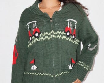 Neuer, ungetragener, dunkelgrüner Cardigan mit Golf-Print für Damen aus der Boutique.