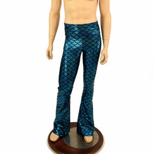 May include: Blue and black mermaid scale print pants with a flared leg.