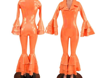 May include: A bright orange jumpsuit with long sleeves and bell bottoms. The sleeves and legs have multiple layers of ruffles. The jumpsuit has a collar and a V-neck.