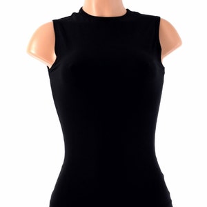 May include: A black sleeveless mock neck shirt on a mannequin. The shirt is fitted and has a smooth texture.