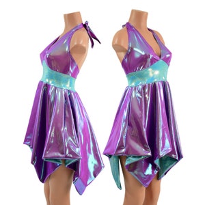 May include: A purple and blue iridescent halter dress with a short, asymmetrical skirt. The dress has a V-neckline and a tie at the back of the neck.