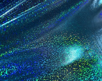 May include: Close-up of a blue iridescent fabric with a subtle sparkle. The fabric has a textured, shimmering surface.