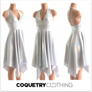 May include: A silver iridescent halter dress with a fitted bodice and a flowing, asymmetrical skirt. The dress has a V-neckline and a halter strap that ties at the back of the neck.