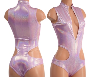 May include: A lavender iridescent bodysuit with a high neck and a front zipper. The bodysuit has cutouts on the sides and a high-cut leg.