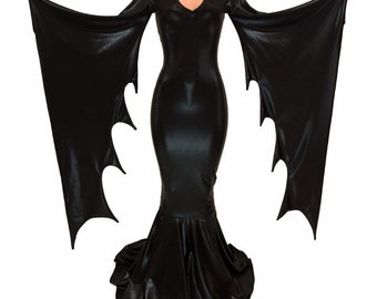 May include: A black, long-sleeved, bat-winged dress with a fitted bodice and a flowing skirt.