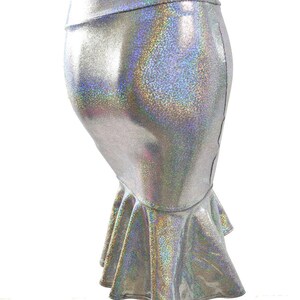 May include: A silver iridescent mermaid skirt with a fitted bodice and a flared, ruffled hem.