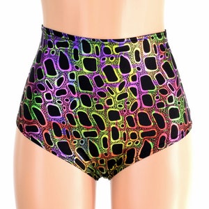 May include: High-waisted black shorts with a colorful abstract pattern. The pattern features a variety of shapes and colors, including green, purple, orange, and red.