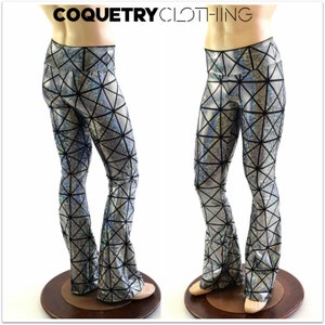 May include: Silver and black geometric patterned leggings with a flared leg.
