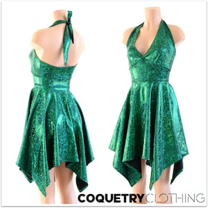 May include: A green halter dress with a sparkly, iridescent finish. The dress has a fitted bodice and a flowing, asymmetrical skirt.
