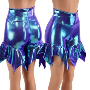 May include: High-waisted shorts with a ruffled hem in a iridescent purple and teal fabric.