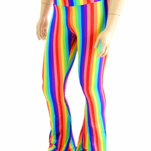 May include: Rainbow striped flared pants. The pants are made of a stretchy fabric and have a high waist.