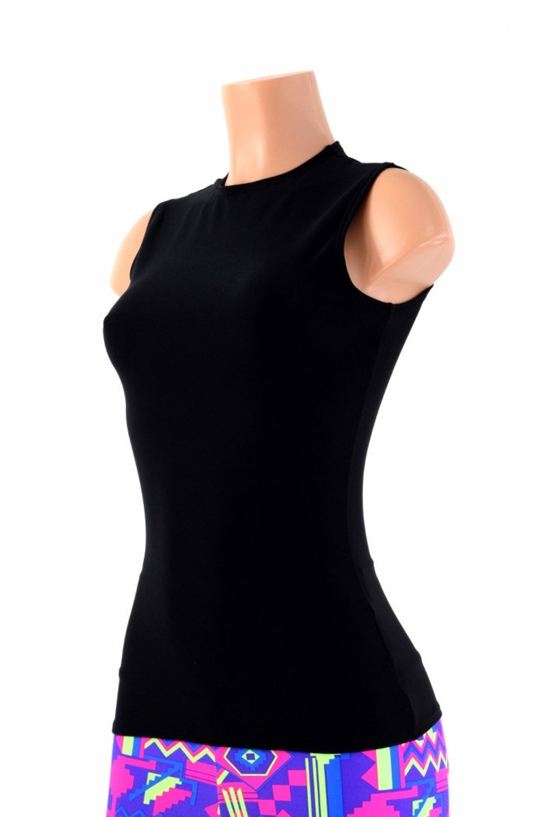 May include: A black sleeveless shirt with a mock neck. The shirt is fitted and has a smooth texture.