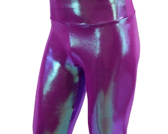 May include: Purple iridescent cycling shorts with a high waist.