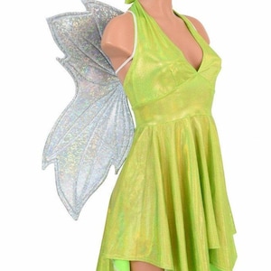 May include: A lime green halter dress with a silver iridescent fairy wing. The dress has a V-neckline and a flowing skirt.