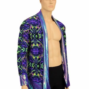 May include: A long-sleeved, open-front jacket with a psychedelic print in shades of purple, green, and black. The jacket has a iridescent trim.