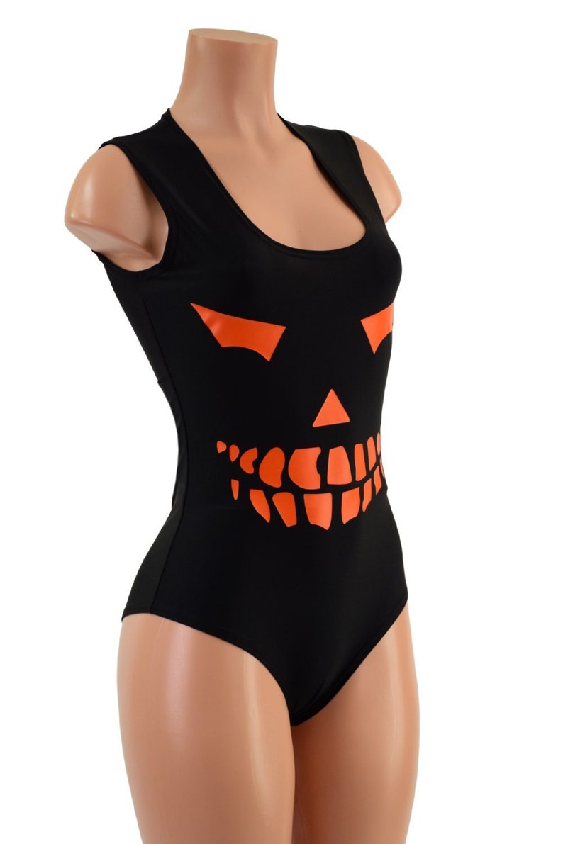 May include: Black sleeveless bodysuit with an orange jack-o'-lantern face graphic.