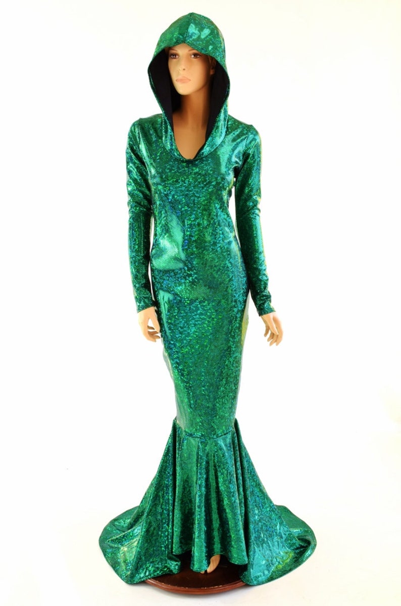 May include: A long-sleeved, green mermaid-style dress with a hooded neckline. The dress has a shimmering, iridescent finish.