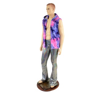 May include: A mannequin is wearing a sleeveless hooded vest and flared pants. The vest is a tie-dye pattern of pink, purple, and blue. The pants are silver with a holographic sheen. The mannequin is standing on a brown wooden base.