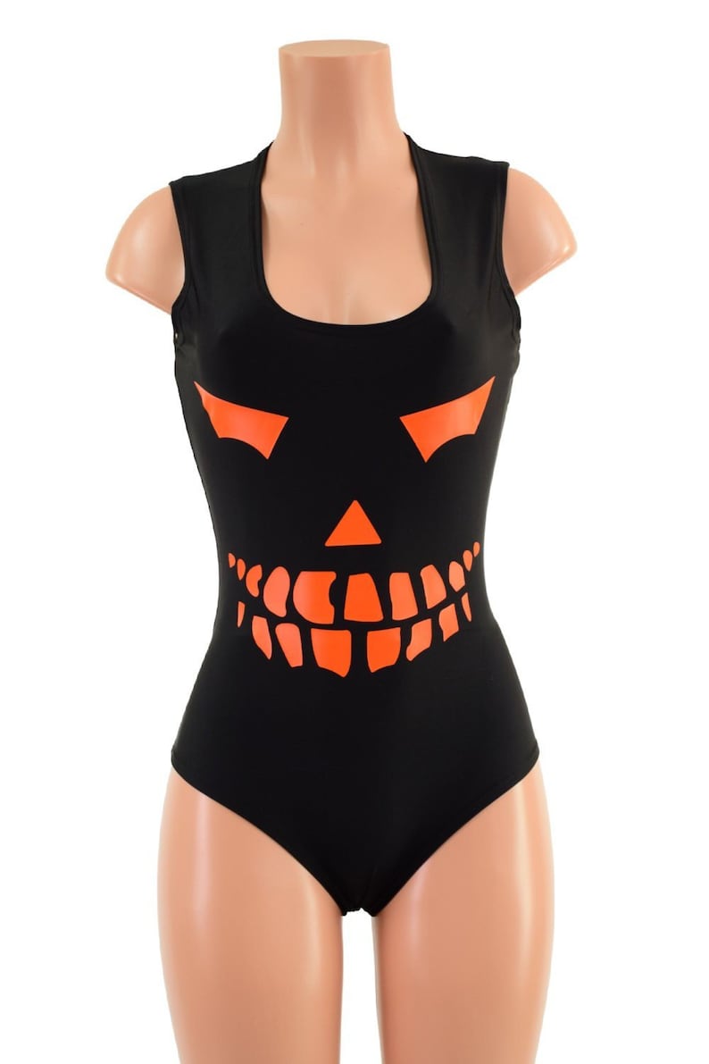 May include: Black sleeveless bodysuit with an orange jack-o'-lantern face graphic.