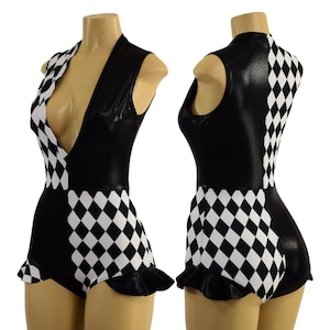 May include: Black and white checkerboard pattern bodysuit with a deep V-neckline and a ruffled hem.
