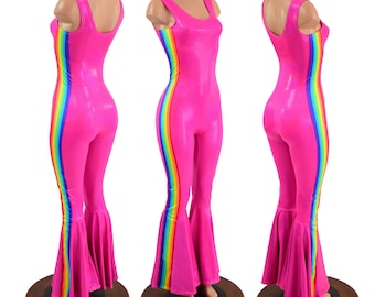 May include: A pink jumpsuit with a rainbow stripe down the side. The jumpsuit has a scoop neck and a flared leg.