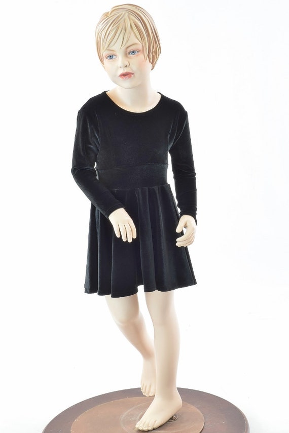 girls black velvet dress Special Occasion in is the perfect for any occasion  Classic Girl Annistyn is wearing the 7/8. Iris Dress | Tiered Black