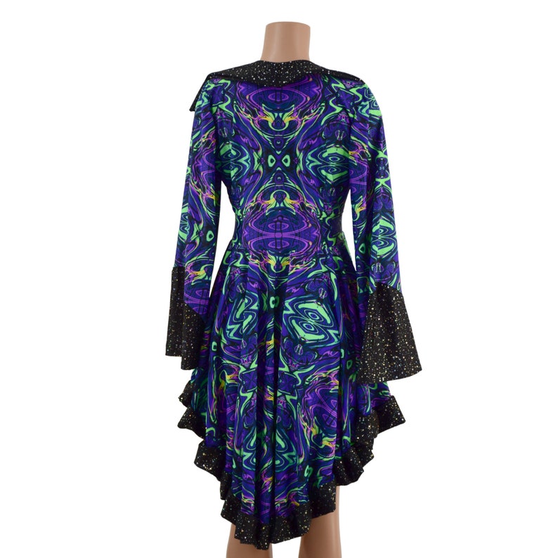 May include: A long-sleeved dress with a black trim and a swirling, psychedelic print in shades of purple, green, and black.