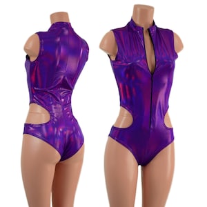 May include: A sleeveless, purple bodysuit with a high collar and a front zipper. The shiny fabric has a holographic effect. The bodysuit features cut-out details at the waist.