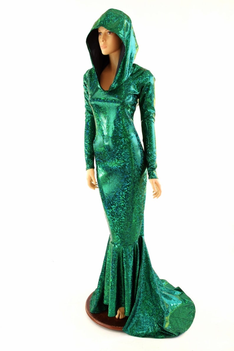 May include: A long-sleeved, green, mermaid-style dress with a black hooded neckline. The dress has a shimmering, iridescent finish.