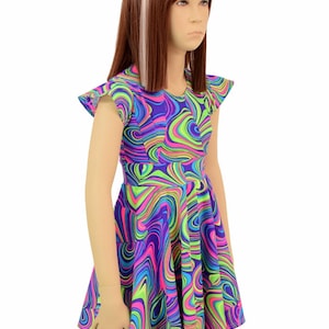 May include: A purple, green, pink, and blue swirl print skater dress with short ruffle sleeves. The dress is made of a stretchy, comfortable fabric.