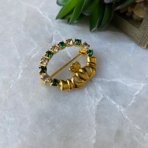 Soloor brooch store