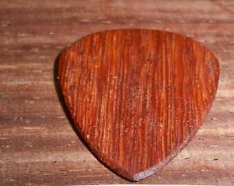 Red Cumaru wood guitar pick