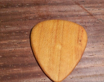 Cherry wood guitar pick