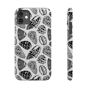 May include: A white iPhone case featuring a repeating pattern of black seashells. The design includes various shell types, some with dotted patterns and others with striped details. The text "Girl loves sea" is also visible.