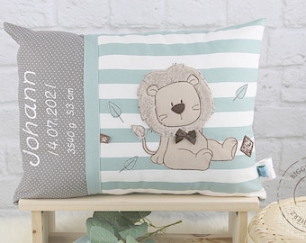 Personalized children's pillow for birth or baptism. With small lion green-white made of cotton fabric. Custom-made for you.