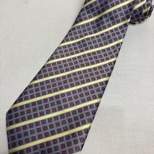 Vintage 1970's Wide Kipper Tie Made in Malta  Jacquard Woven Polyester Stripe Geometric Blue Yellow Red