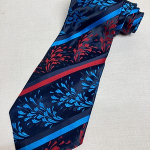 Vintage 1970's Wide Kipper Tie Made in Malta  Jacquard Woven Polyester Floral Stripe Red Navy Blue Satin