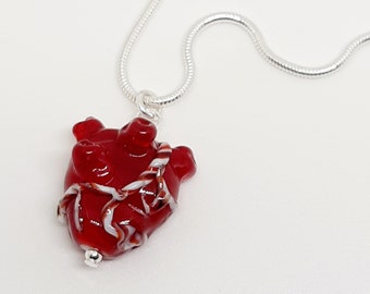 Tiny glass anatomical heart necklace