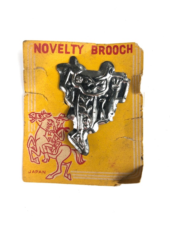 1950s NOS Vintage Tin Cowboy Saddle Brooch Pin Car