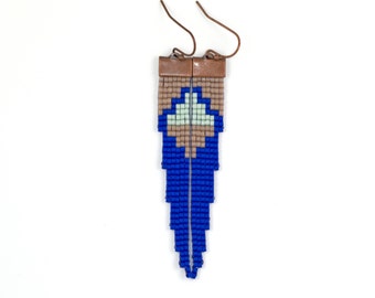 May include: A pair of blue and brown beaded earrings with a geometric design. The earrings are made with small beads and have a tassel-like shape.