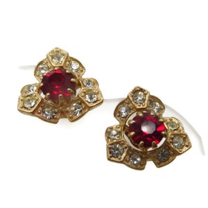 May include: A set of three ceramic mugs with a speckled, matte finish. The mugs are in shades of cream, light gray, and dark gray. Each mug has a simple, minimalist design and a rounded handle. Perfect for coffee or tea.