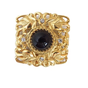 Vintage Black and Gold Rhinestone Studded Brooch