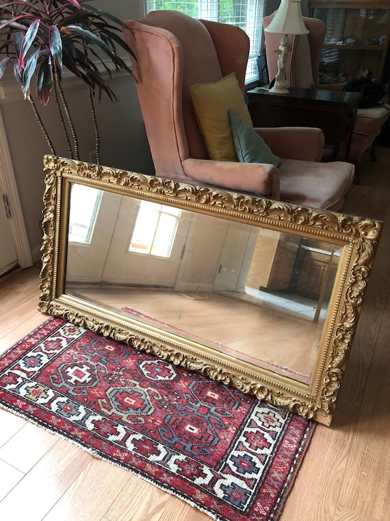 Antique Beveled Mirror Within Carved and Gesso Wooden Frame